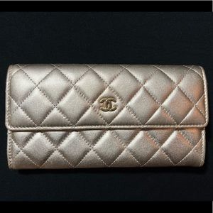 Chanel long flap wallet in gold